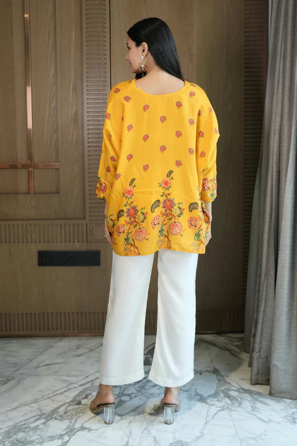 Woman wearing a Yellow Printed Loose Top With Cream Pant Co-Ord 