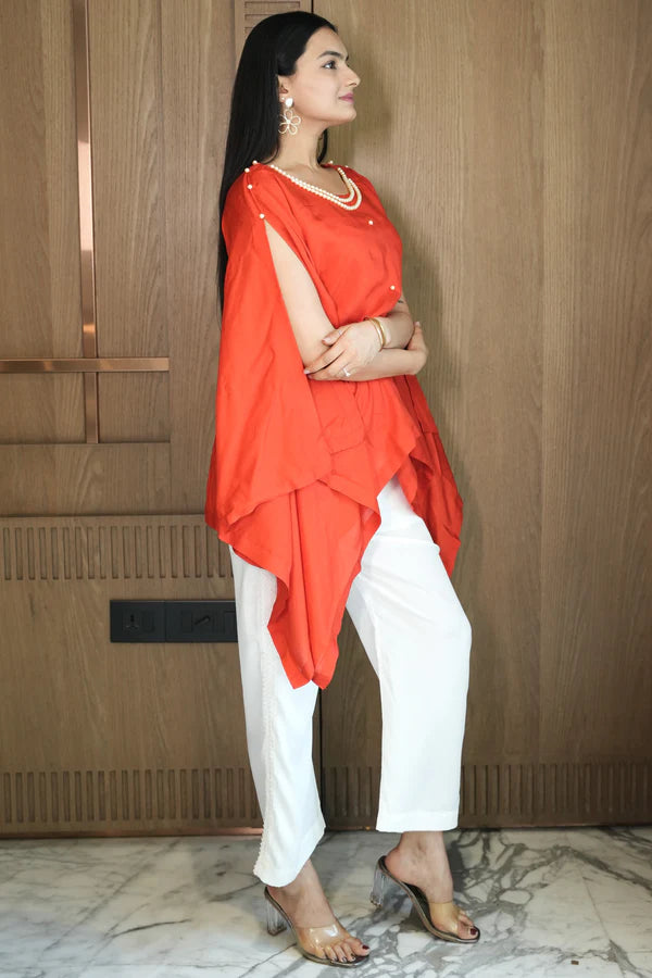 Woman wearing a Red Loose Top With Cream Pant Co-Ord 