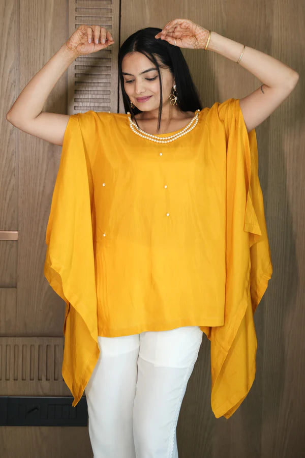 Woman wearing a Yellow Plain Loose Top With White Pant Co-Ord Set