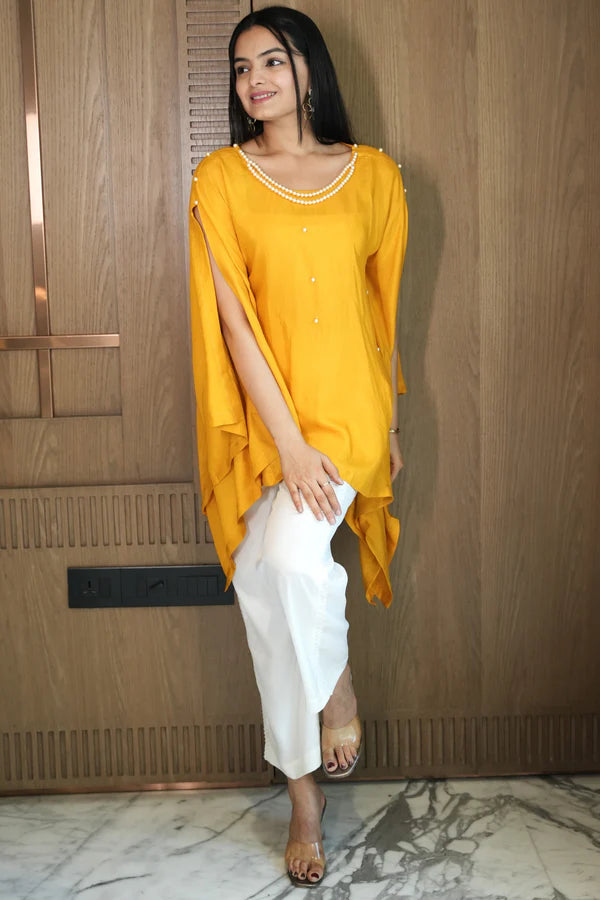 Woman wearing a Yellow Plain Loose Top With White Pant Co-Ord Set
