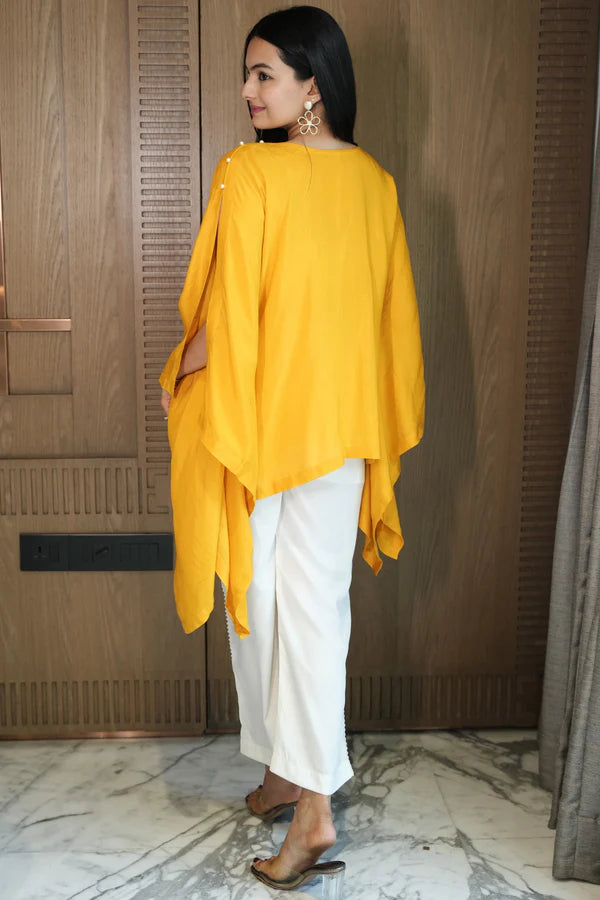 Woman wearing a Yellow Plain Loose Top With White Pant Co-Ord Set