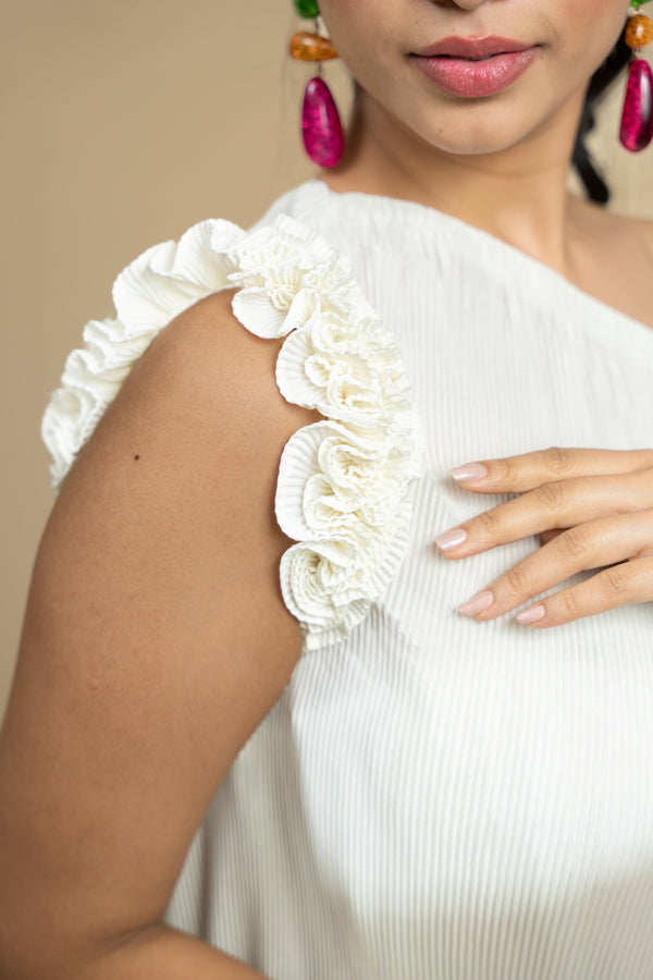 Woman wearing a Cream one-shoulder dress 