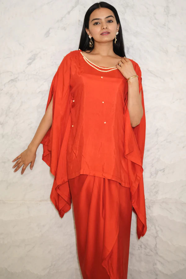 Woman wearing a Red Loose Top With Wrap Round Skirt With Buckle Co-Ord Set