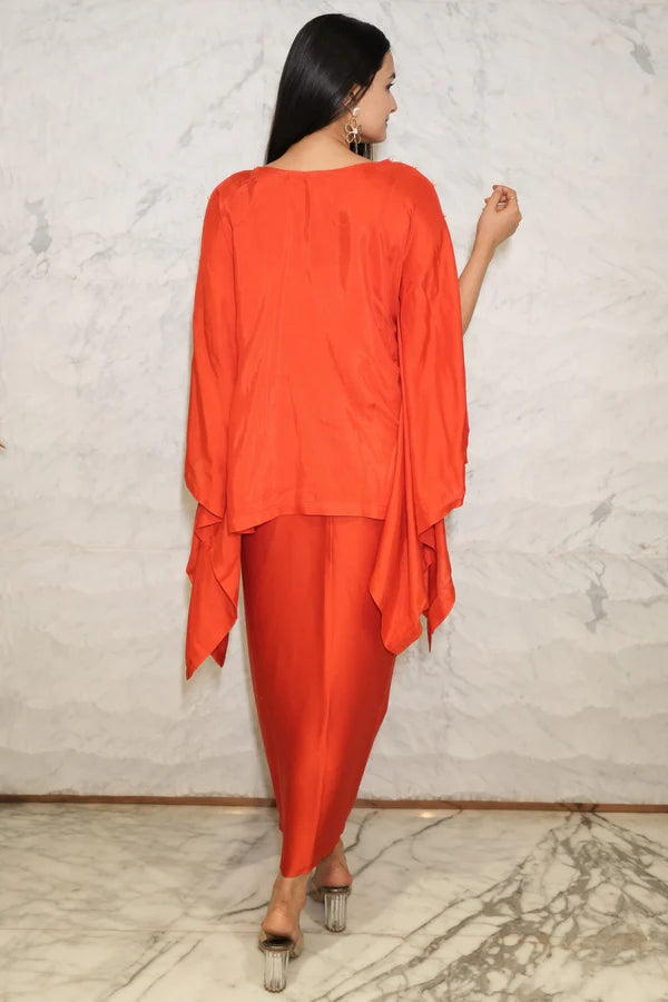 Woman wearing a Red Loose Top With Wrap Round Skirt With Buckle Co-Ord Set