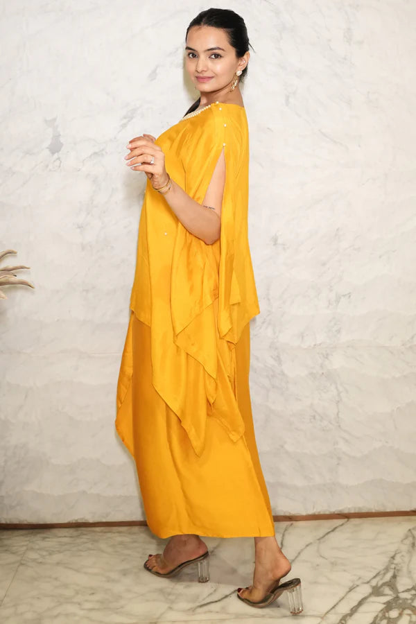 Woman wearing a Mustard Yellow Loose Top With Wrap Round Skirt With Buckle Co-Ord Set