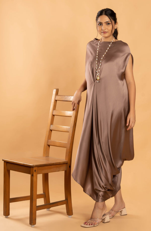Woman wearing a Copper Cowl dress 