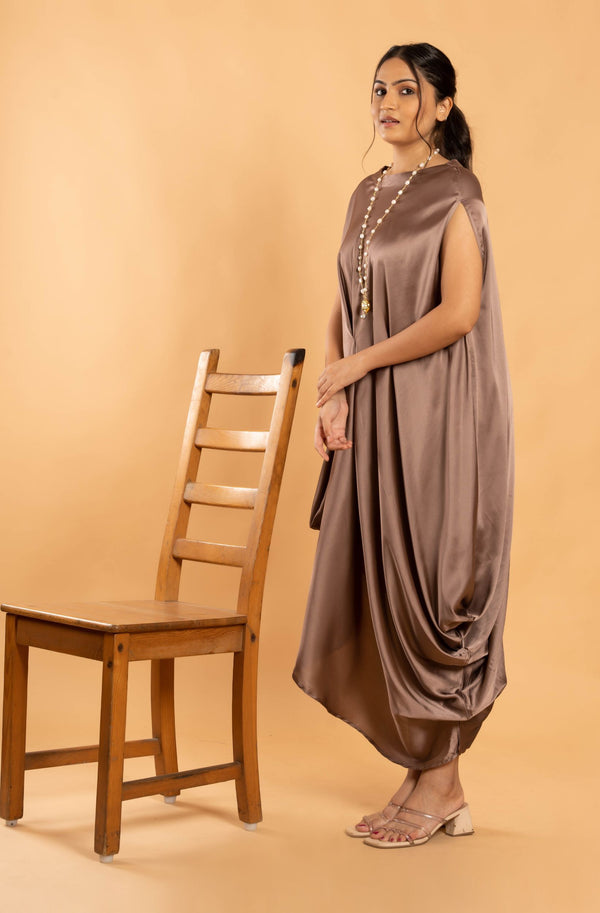 Woman wearing a Copper Cowl dress 