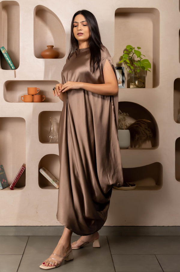 Woman wearing a Copper Cowl dress 