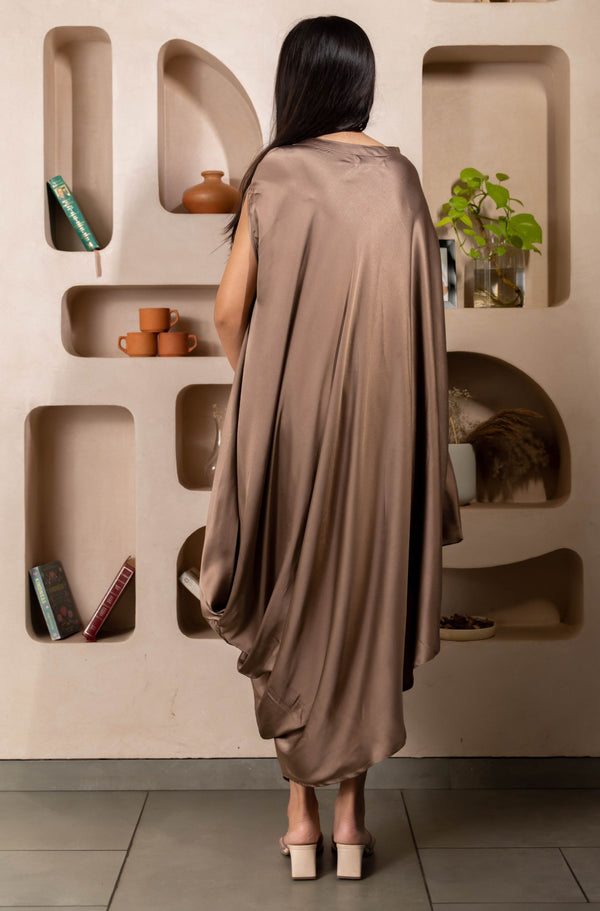 Woman wearing a Copper Cowl dress 