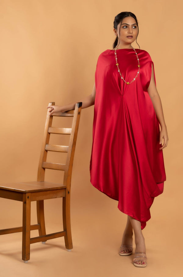 Woman wearing a Pink Cowl dress 