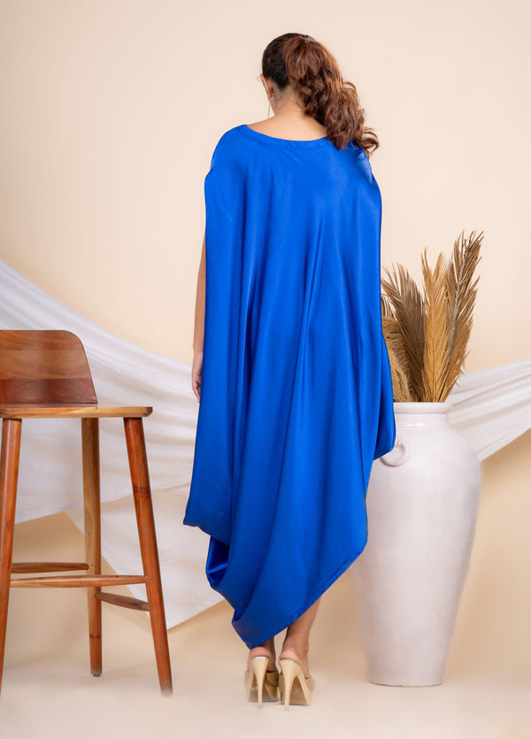Woman wearing a Blue Cowl dress 