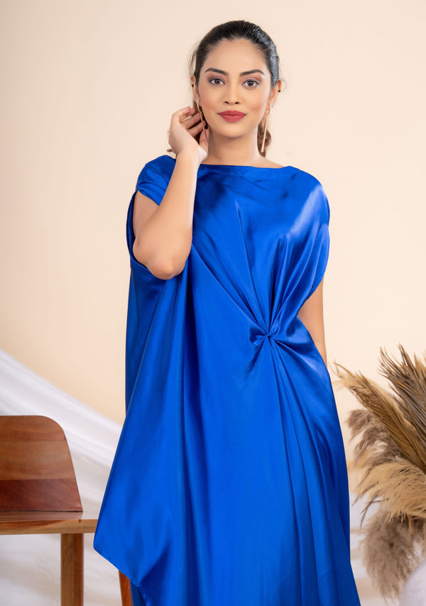 Woman wearing a Blue Cowl dress 