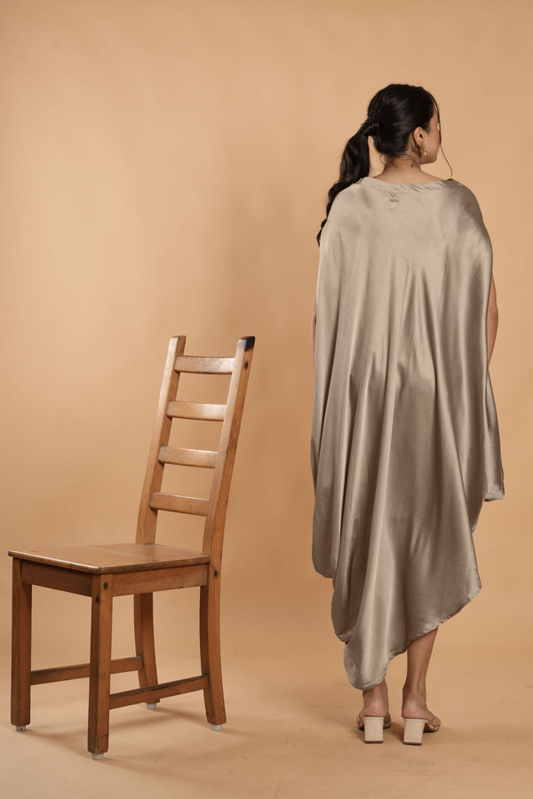 Woman wearing a Silver Cowl dress 