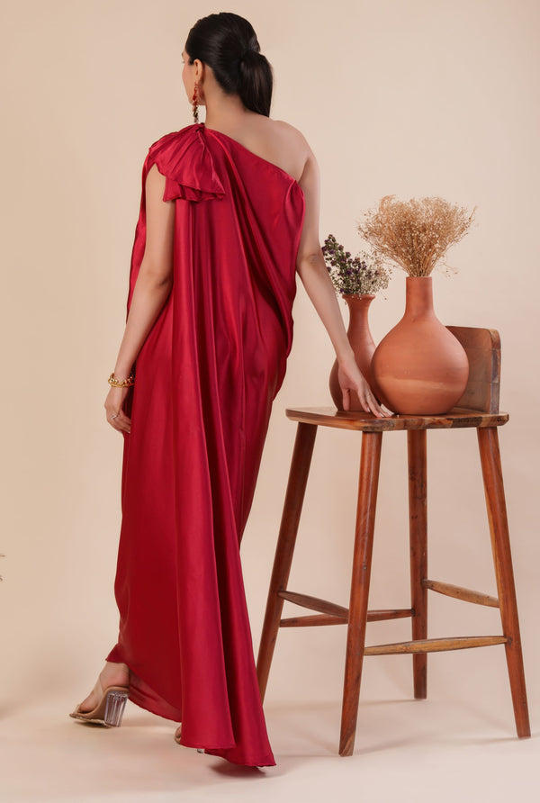 Woman wearing a red one-shoulder dress 