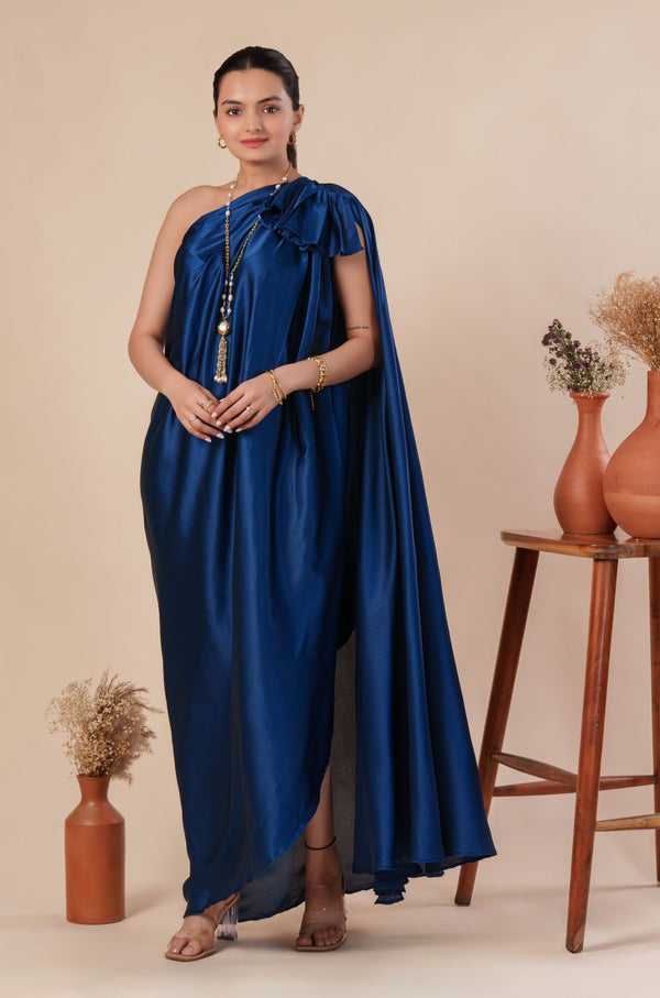 Woman wearing a blue one-shoulder dress 
