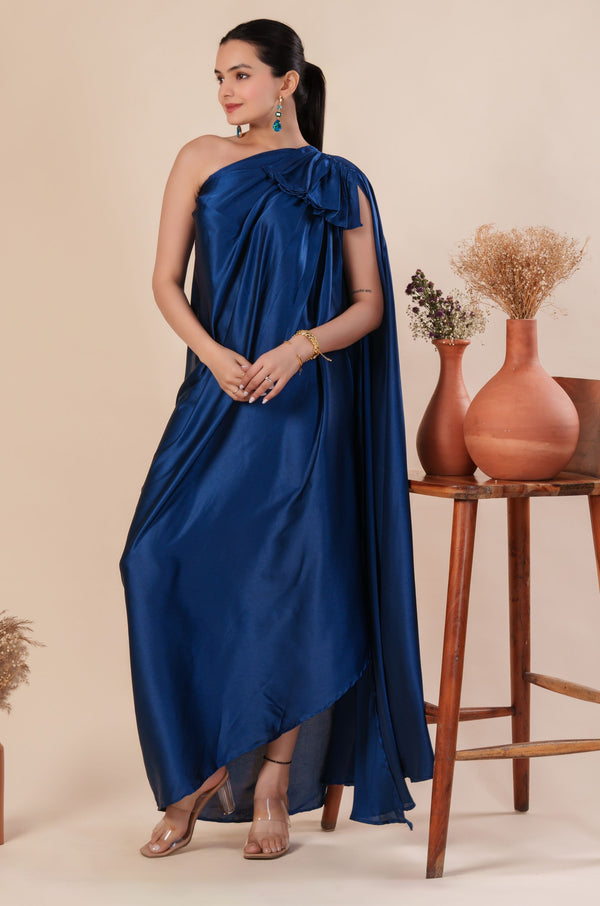 Woman wearing a blue one-shoulder dress 