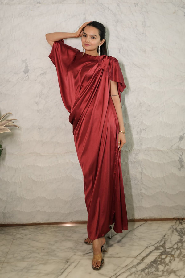 Woman wearing a Maroon red Pleated Drape Gown Dress
