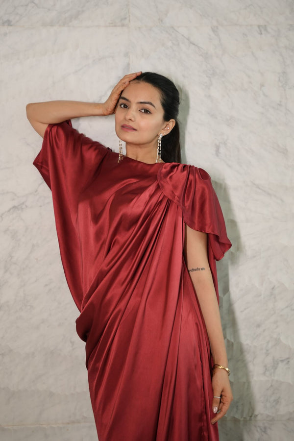 Woman wearing a Maroon red Pleated Drape Gown Dress