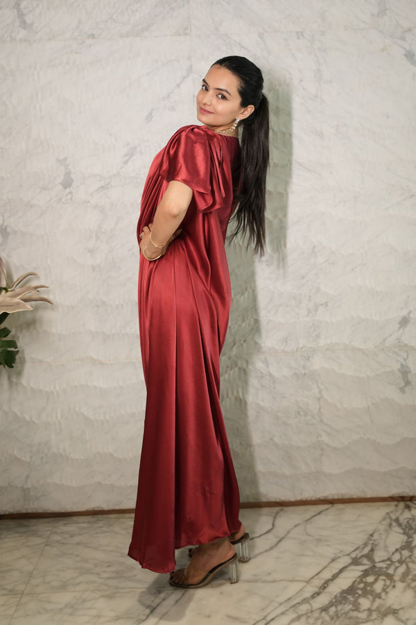 Woman wearing a Maroon red Pleated Drape Gown Dress