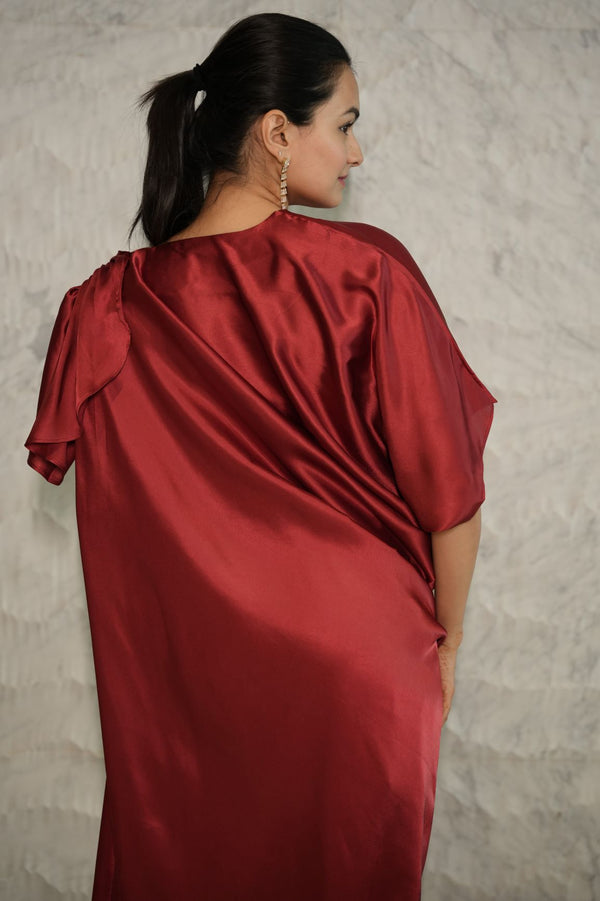 Woman wearing a Maroon red Pleated Drape Gown Dress