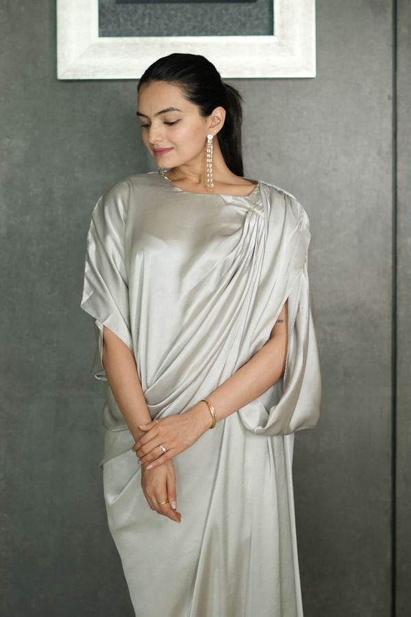 Woman wearing a silver Pleated Drape Gown Dress 