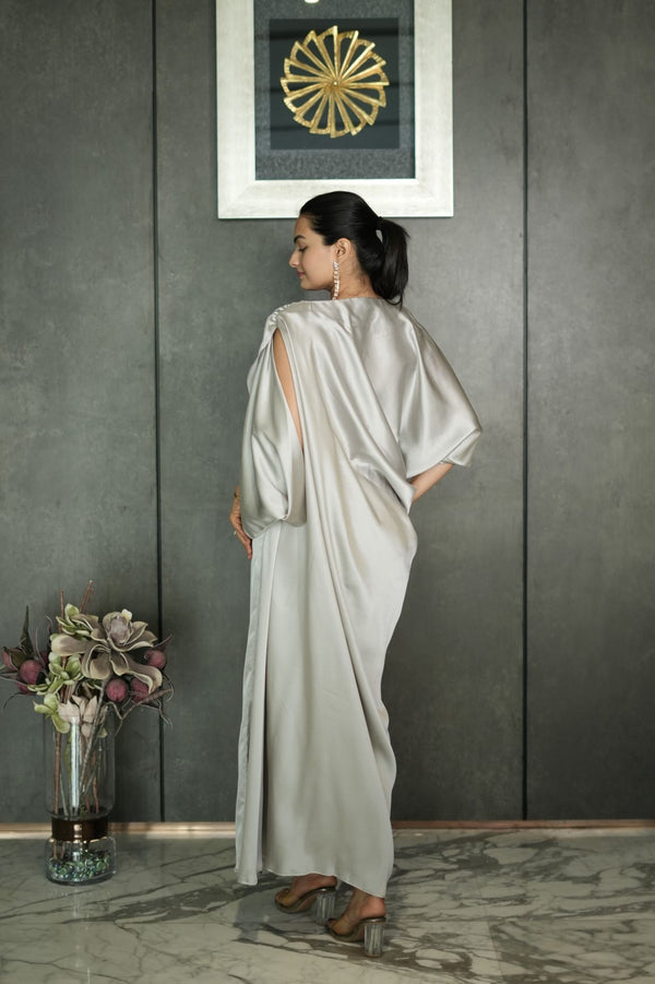 Woman wearing a silver Pleated Drape Gown Dress 