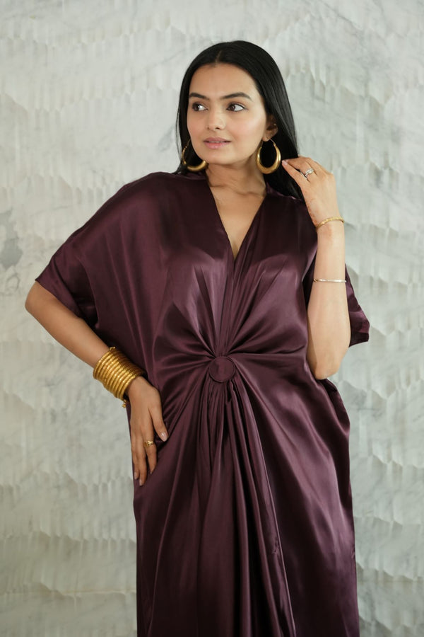 Woman Wearing a Dark Purple Kaftan Dress 