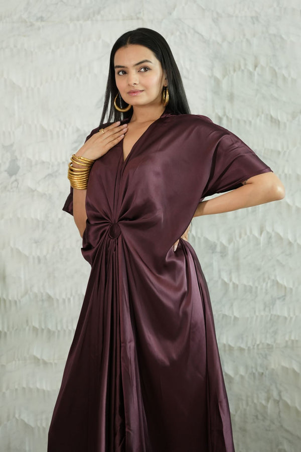 Woman Wearing a Dark Purple Kaftan Dress 