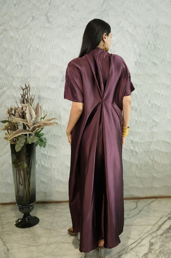 Woman Wearing a Dark Purple Kaftan Dress 